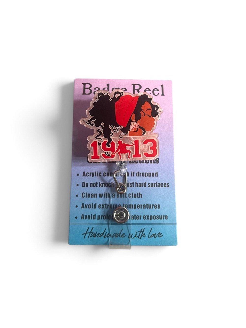 Delta 1913 Acrylic Badge Reel with Black Hair & Red